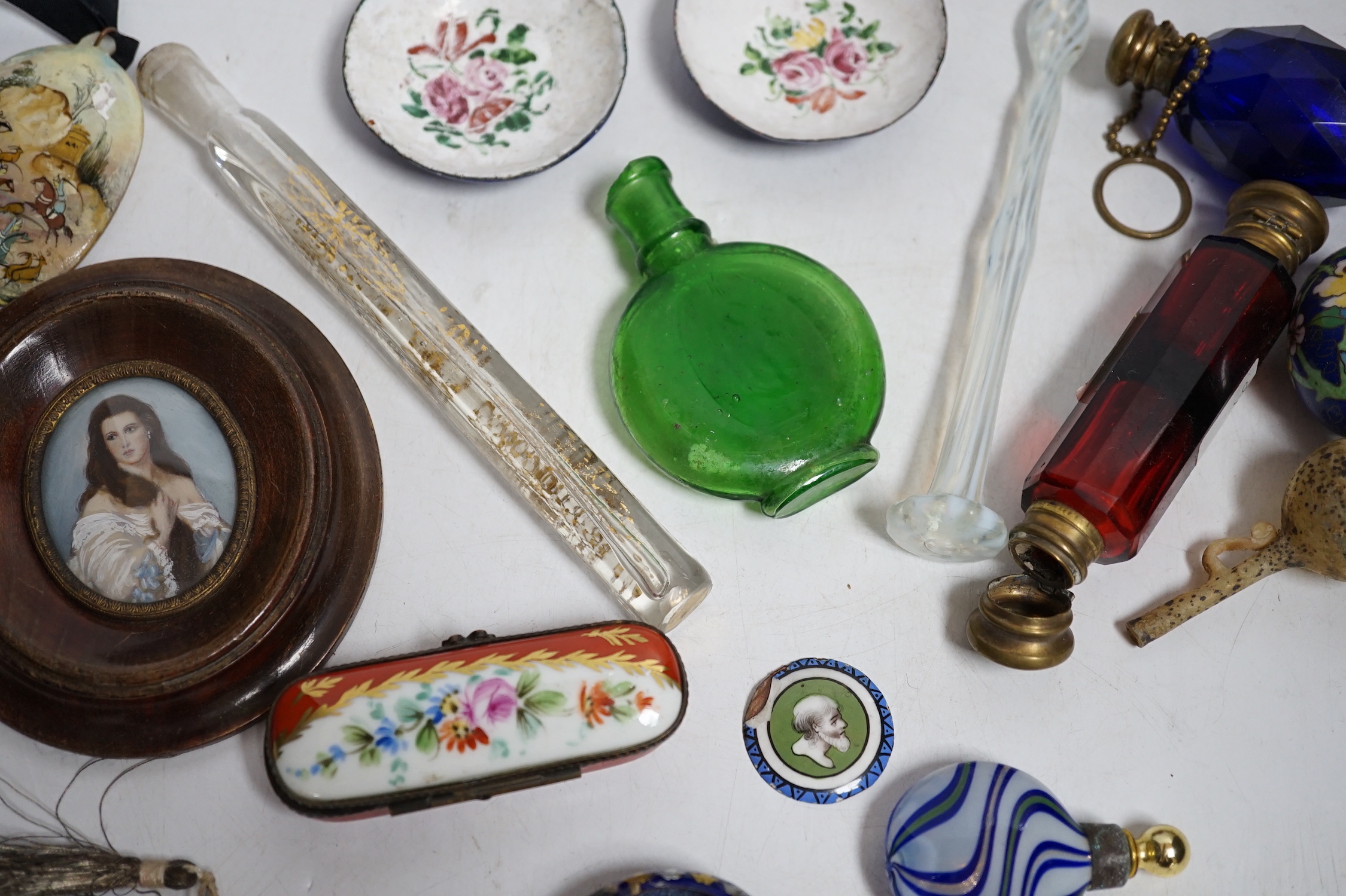 A collection of scent bottles, a miniature antiquity vessel and a miniature of a lady